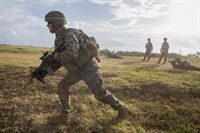 Cpl. Logan Jenkins, an infantry assault Marine with Battalion Landing Team, 2nd Battalion, 5th Marine Regiment, 31st Marine Expeditionary Unit, rushes to his firing position during live-fire and maneuver drills at Camp Hansen, Okinawa, Japan, Dec. 22, 2016. As the Marine Corps&#39; only continuously forward-deployed unit, the 31st MEU air-ground-logistics team provides a flexible force, ready to perform a wide range of military operations, from limited combat to humanitarian assistance operations, through the Indo-Asia-Pacific region.