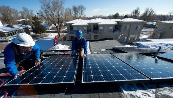 The updated Database of State Incentives for Renewables & Efficiency helps homeowners and businesses find incentive programs that can reduce or defray installation or purchase costs of technologies like photovoltaic systems. | Photo by Dennis Schroeder, National Renewable Energy Laboratory 