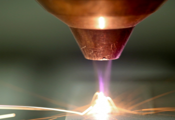 Deposition of Inconel coating on a steel substrate using laser additive manufacturing technology from DM3D.
<em>Photo courtesy of Oak Ridge National Laboratory</em>