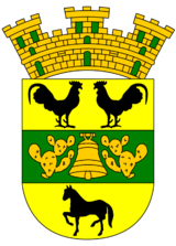 The Coat of Arms represents the Taínos.