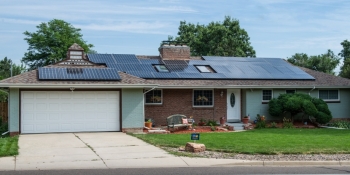 Financial incentives and financing programs can help with the cost of making energy efficient home improvements and installing renewable energy systems, such as solar electricity. | Photo courtesy of Dennis Schroeder/NREL.