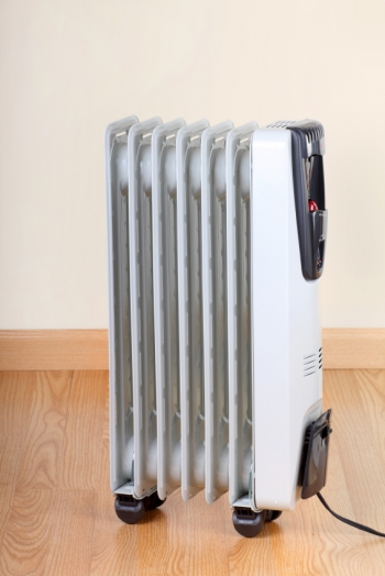 Portable heaters can be an efficient way to supplement inadequate heating. | Photo courtesy iStockphoto.com