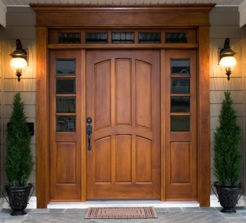 Although many people choose wood doors for their beauty, insulated steel and fiberglass doors are more energy-efficient. | Photo courtesy of Â©iStockphoto/cstewart
