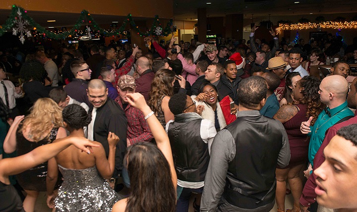 USS John C. Stennis' crew and family members dance during a command holiday party. For someone concerned about alcohol intake or battling substance abuse, social events may seem threatening. (U.S. Navy photo by Mass Communication Specialist 3rd Class Jonathan Jiang)