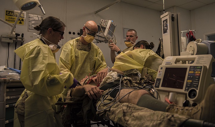 Members of the 455th Expeditionary Medical Group assess a mock victim during a mass casualty exercise at Bagram Airfield, Afghanistan, May 21, 2016. This exercise was conducted to test the medical readiness and skills of the squadron during an emergency to sharpen operational readiness. (U.S. Air Force photo by Senior Airman Justyn M. Freeman)