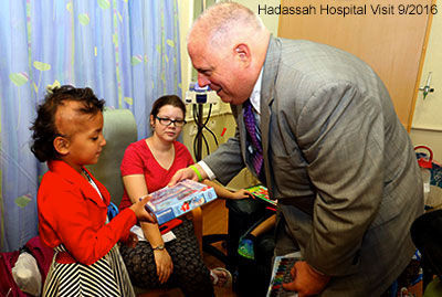 Governor with a patient at the hospital