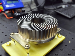 The Sandia Cooler's innovative, compact design combines a fan and a finned metal heat sink into a single element, efficiently transferring heat in microelectronics and reducing energy use. | Photo courtesy of Sandia National Laboratories.