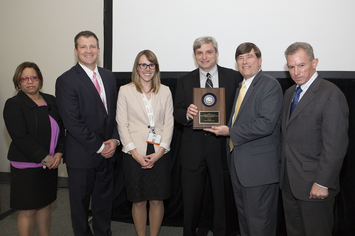 Mr. Robert Foster, Department of the Navy Chief Information Officer (DON CIO); Ms. Janice Haith, Director, DON Deputy CIO (Navy); and Mr. Kenneth Bible, Deputy Director, HQMC C4, U.S. Marine Corps, presented a DON IM/IT Innovative Solution Award to the PEO EIS, PMW 240 Mobility Team,  Ken Johnson, Jake Aplanalp and Emily Antos, during the awards ceremony at the DON IT West Coast Conference on February 17, 2016.