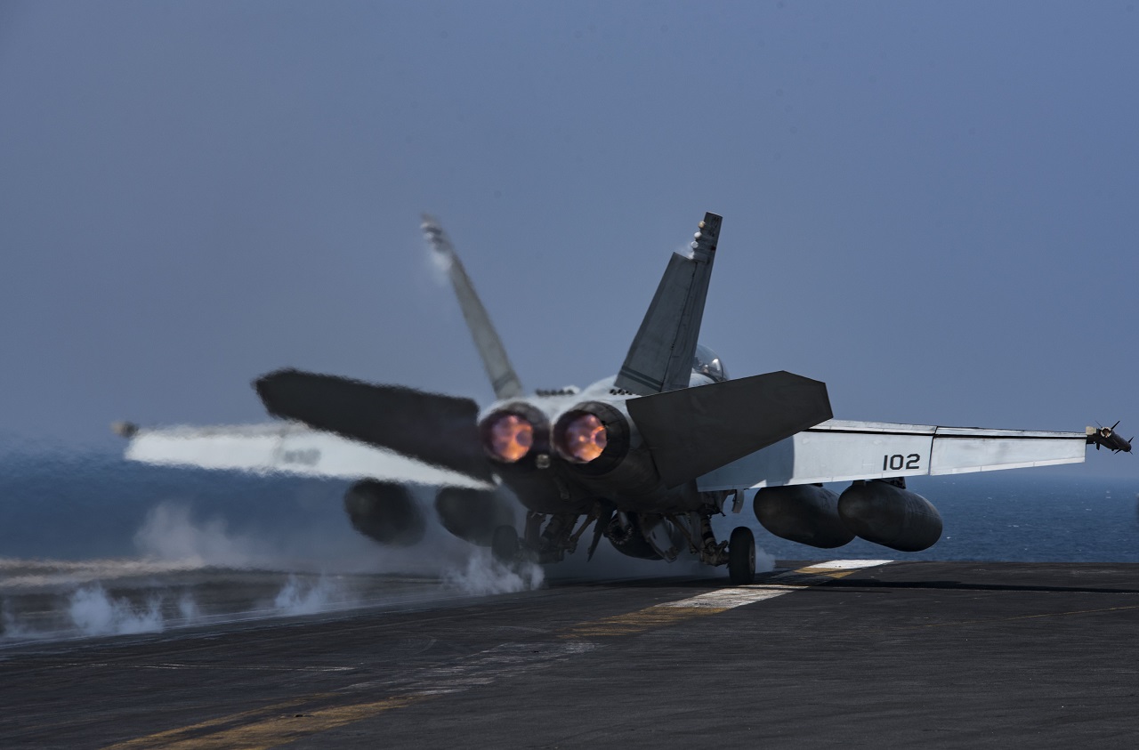 An F/A-18F Super Hornet, assigned to Strike Fighter Squadron (VFA) 32, launches from the flight deck of the aircraft carrier USS Dwight D. Eisenhower (CVN 69) (Ike). Ike and its carrier strike group are deployed in support of Operation Inherent Resolve, maritime security operations and theater security cooperation efforts in the U.S. 5th Fleet area of operations. U.S. Navy photo/Petty Officer 3rd Class Nathan T. Beard 