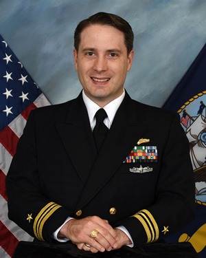 Official Photo, U.S. Navy Lt. Cmdr. Rollie J. Wicks  

