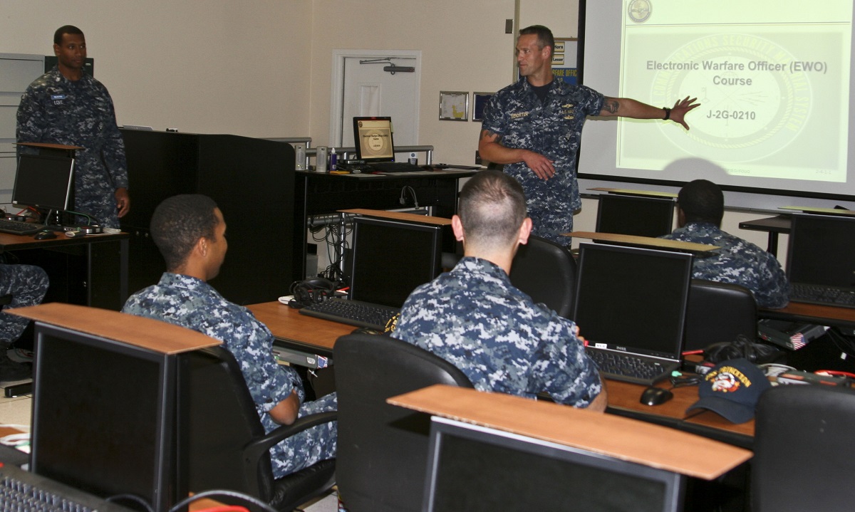 SAN DIEGO (Sept. 13, 2016) Chief Warrant Officer 3 Dane Beichter teaches students attending the updated Electronic Warfare Officer (EWO) Course at  Information Warfare Training Command San Diego. The EWO course of instruction is designed to provide naval officers serving as EWOs and senior cryptologic technician (technical) personnel serving as assistant EWOs with the basic knowledge and skills to manage shipboard EW functions and resources at the unit level and in support of strike group operations. U.S. Navy photo by Michele Diamond/Released