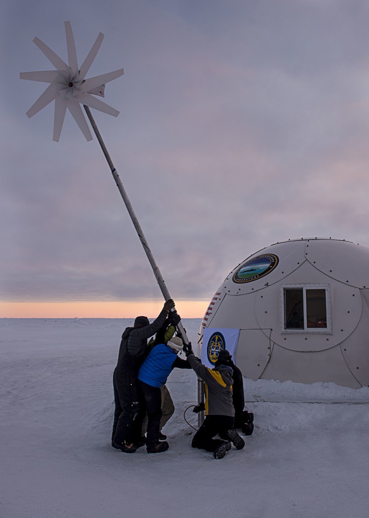 Arctic Circle: Sailors and civilians, assigned to the Arctic Submarine Lab, assemble a wind-powered turbine to supply some of Ice Camp Sargo with energy during Ice Exercise (ICEX) 2016. U.S. Navy photo by Mass Communication Specialist 2nd Class Tyler Thompson 