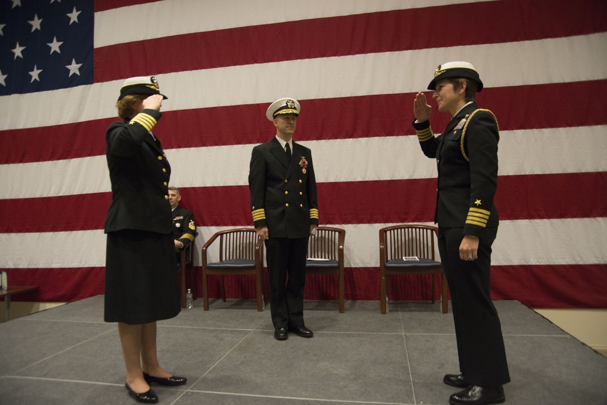 NAVY INFORMATION DOMINANCE FORCES, Suffolk, Va. (December 04, 2015) -- Capt. Roberta Belesimo assumes command of Navy Reserve Navy Information Dominance Forces Operations during a change of command.  Capt. Roberta Belesimo relieved Capt. Michael “Barry” Tanner as commanding officer of NR NAVIDFOR Ops during a ceremony held in the Navy Global Network Operations and Security Center. U.S. Navy photo by Michael J. Morris 