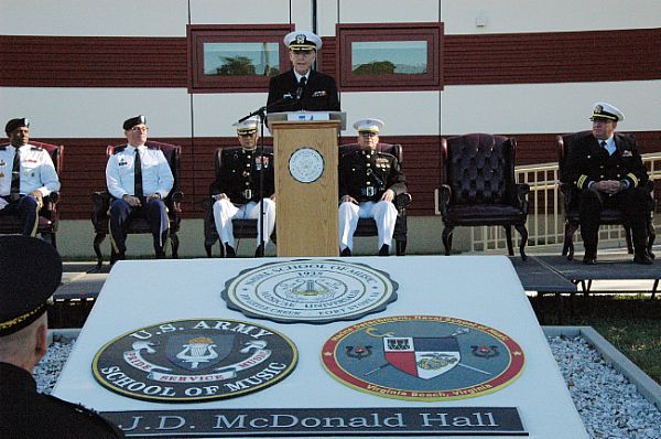 VIRGINIA BEACH, Va. (Oct. 25, 2016) Capt. Ken Collins, Commanding Officer of the U.S. Navy Band, delivers a speech during the ribbon cutting ceremony for the Naval School of Musics grand opening of its newly renovated facilities in Virginia Beach, Va. The school building was rebuilt from top to bottom and an additional rehearsal annex was added. U.S. Navy photo by Kathleen Weiss.