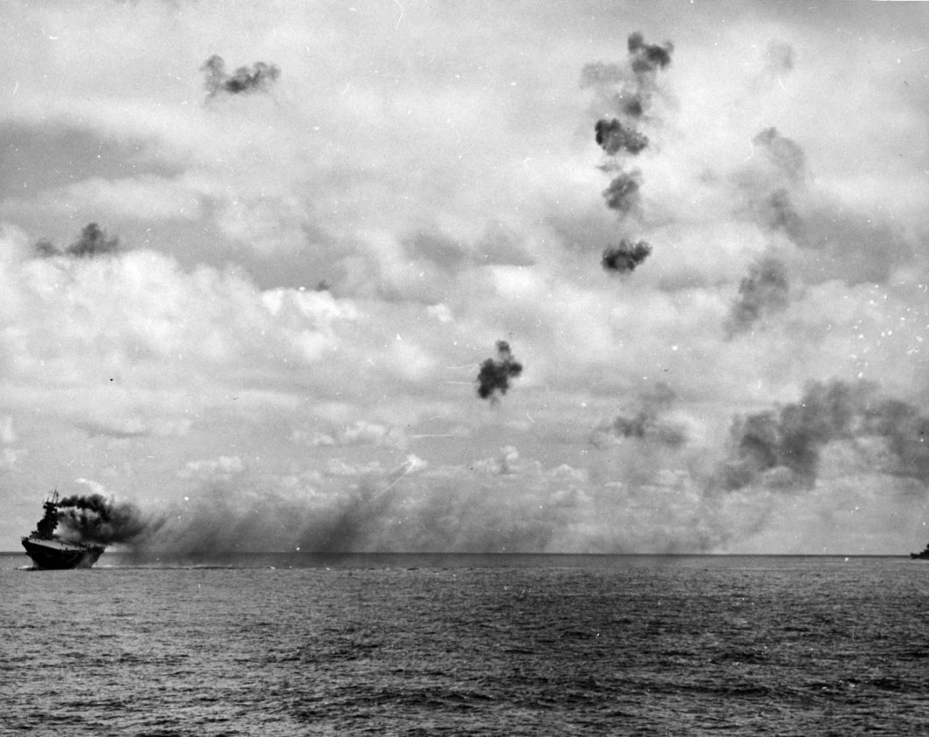 USS Yorktown (CV 5) burning, photographed during the Battle of Midway, June 1942.

