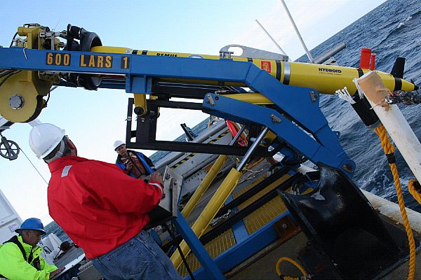 NORTH SEA (Sept. 17, 2010) Naval Oceanographic Office surveyors John Suslavage and David Small prepare to launch autonomous underwater vehicle, REMUS 600 aboard the Military Sealift Command oceanographic survey ship USNS Henson (T-AGS 63). They are in search of the remains of John Paul Jones' Revolutionary War ship Bonhomme Richard, which was lost off the coast of England in 1779 after a decisive battle with HMS Serapis. Jones won the battle and seized HMS Serapis as Bonhomme Richard was heavily damaged and sank 36 hours later. U.S. Navy photo by Rebecca Burke.