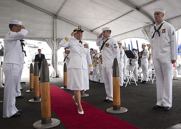 PEARL HARBOR (March 11, 2015) Rear Adm. Alma Grocki, director of Fleet Maintenance U.S. Pacific Fleet and 27-year Navy Reservist, passes through sideboys during the Navy Reserve Centennial Commemoration (NRCC) ceremony aboard the Battleship Missouri Memorial. Established on March 3, 1915, the NRCC celebrated 100 years of service by the U.S. Navy Reserve Force. Today, at least 20,000 Navy Reserve Sailors, approximately one-third of the Navy Reserve's Component, provide fully integrated global operational support to the Fleet and Combatant Commanders. U.S. Navy photo by Mass Communication Specialist 2nd Class Johans Chavarro.