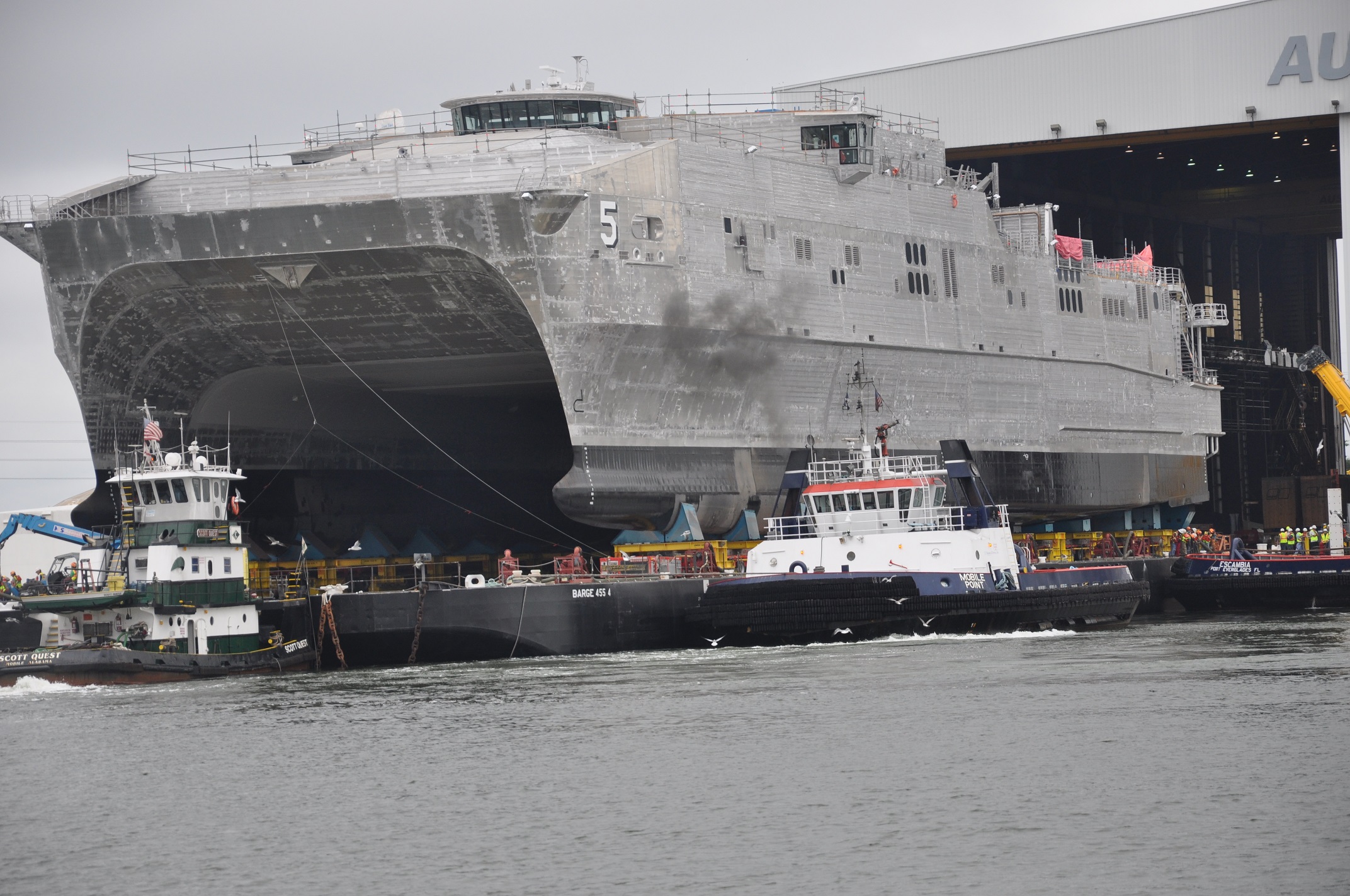 MOBILE, Ala. (Sept. 30, 2014) The future Military Sealift Command joint high-speed vessel USNS Trenton (JHSV 5) rolls out in preparation for launch at Austal USA shipyard. Photo courtesy of U.S. Navy.