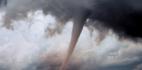 A tornado funnel cloud