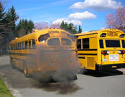 School bus with black smoke.