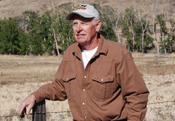 Fawn Rupp standing on his property