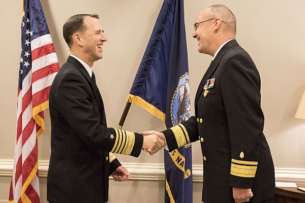 WASHINGTON (Dec. 15, 2015) Chief of Naval Operations (CNO) Adm. John Richardson presides over a promotion ceremony for Rear Adm. C. Forrest Faison in the Pentagon. Faison was promoted to vice admiral and was recently confirmed as Navy surgeon general and chief, Bureau of Medicine and Surgery. U.S. Navy photo by Mass Communication Specialist 1st Class Nathan Laird.