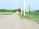 Construction of a berm to protect the Mni Wiconi Rural Water System raw water pump station. June 2011.