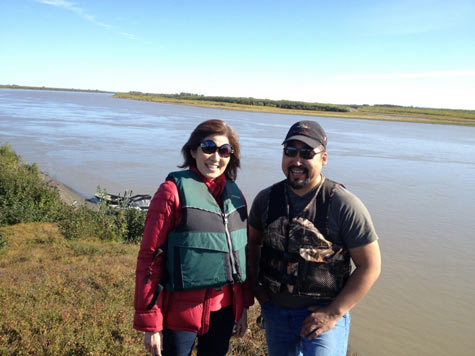 Jane Nishida, Principal Deputy Assistant Administrator for International and Tribal Affairs, and Curtis Mann, Brownfields Coordinator, Orutsararmuit Native Council Kuskokwim River standing in front of water