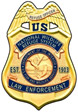 Service Law Enforcement badge. Credit: USFWS.