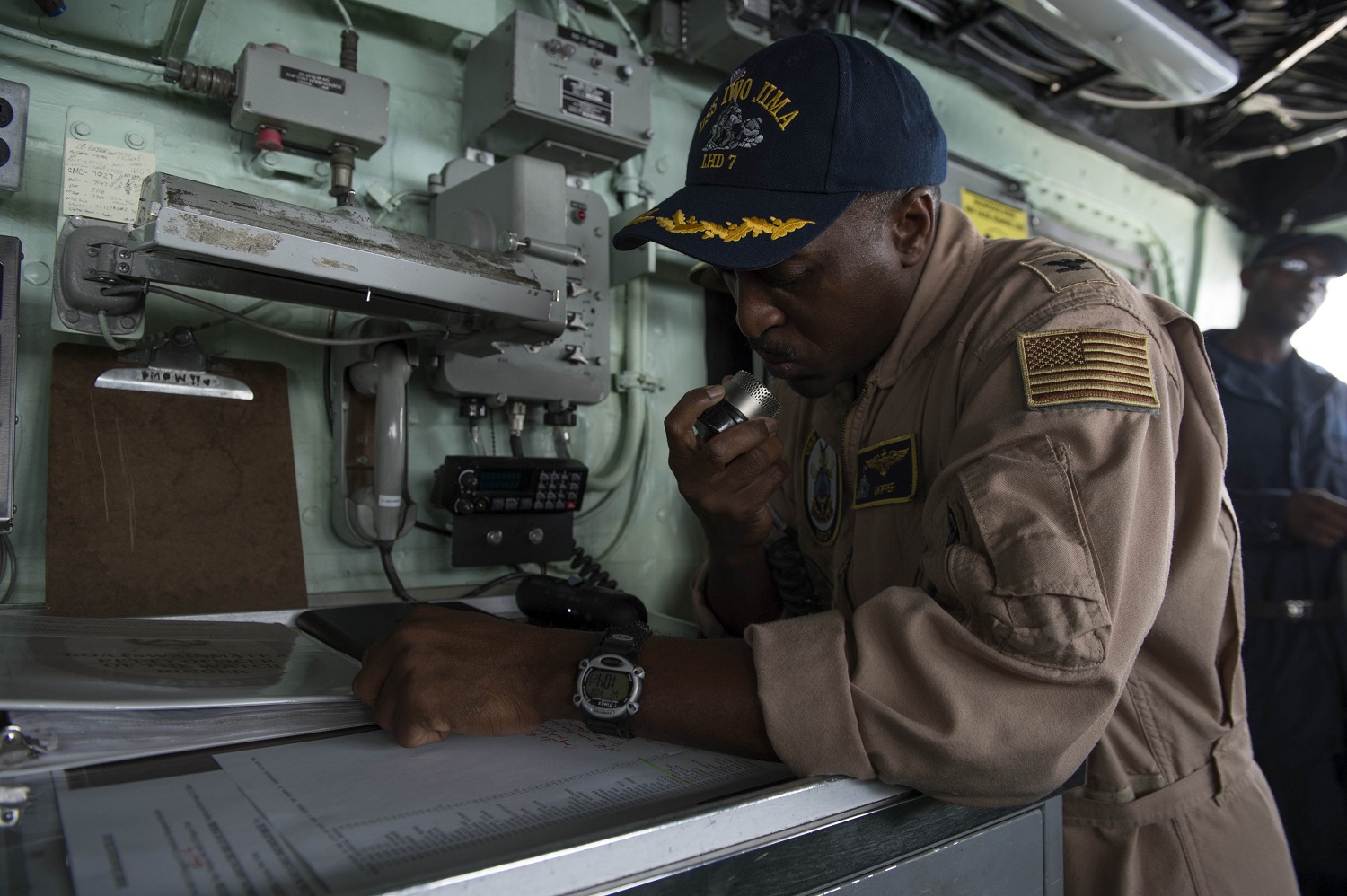 GULF OF ADEN (April 8, 2015) Capt. Dana Gordon, from Columbia, S.C., commanding officer of the amphibious assault ship USS Iwo Jima (LHD 7), makes an announcement from the ship's bridge. Iwo Jima is the flagship for the Amphibious Ready Group and, with the embarked 24th Marine Expeditionary Unit (24th MEU), provides a versatile sea-based, expeditionary force that can be tailored to a variety of missions in the U.S. 5th Fleet area of responsibility. U.S. Navy photo by Mass Communication Specialist Seaman Magen F. Weatherwax.