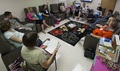 Expectant mothers and family attend a Moms Strong program session at the Wilford Hall Ambulatory Surgical Center, Joint Base San Antonio-Lackland. The program functions as a support system for expectant parents by providing information and insight on what to do before, during and after birth. 