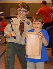 Boy scouts with completed bat house.