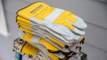 Why volunteer? Habitat for Humanity stack of work gloves