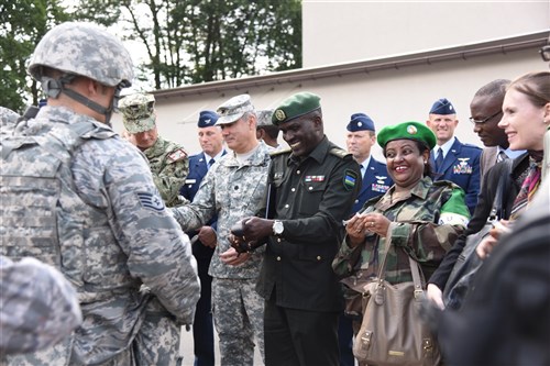 African Partnership Flights Surgeon General Symposium attendees learn tactical casualty combat care procedures during a demonstration at Ramstein AB, Germany, Aug. 25, 2015. This event focused on strengthening U.S. strategic partnerships with leading nations in Africa to enhance regional cooperation and interoperability. (U.S. Air Force photo by Master Sgt. Charlene M. Spade/released) 