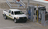 Photo of a truck pulling into a CNG station