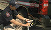 Photo of a police officer fueling a vehicle