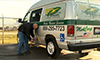 Photo of a man fueling a propane-powered medical transport vehicle