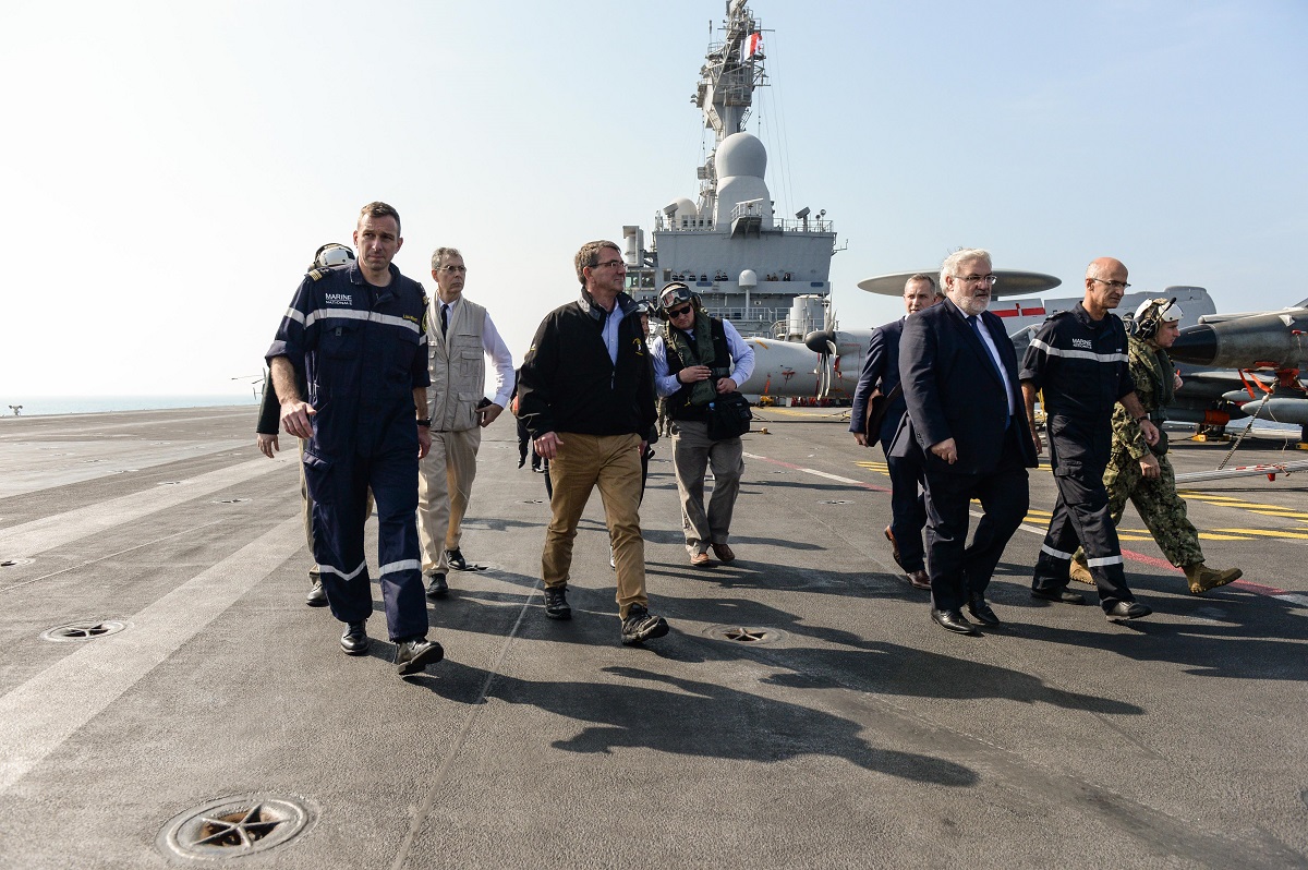 U.S. Defense Ash Carter departs the deck of the flagship of the French Navy the Charles De Gaulle on Dec. 19, 2015. Carter is on a weeklong trip in which he is visiting leaders and deployed service members in the Middle East and Afghanistan. DoD photo by Army Sgt. 1st Class Clydell Kinchen