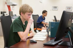 Two high school students scanning as a part of their THATclass experience