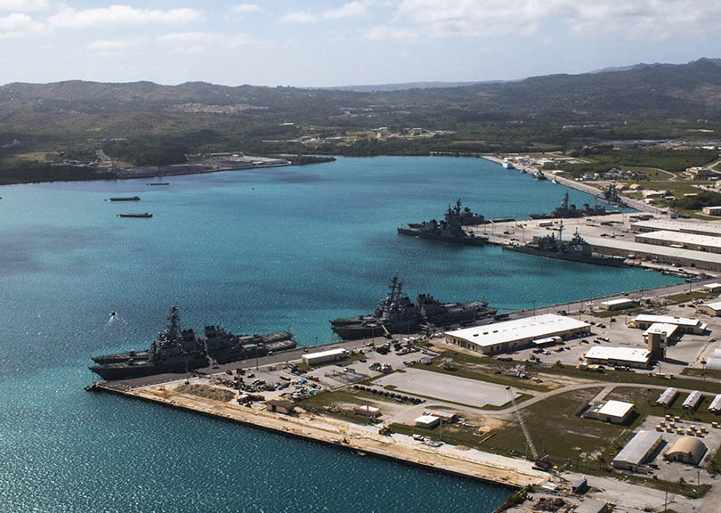 APRA HARBOR, Guam (March 5, 2016) – An aerial view from above U.S. Naval Base Guam (NBG) shows Apra Harbor with several navy vessels in port - as many as 22 total ships at one given time - marking the largest in-port presence at NBG in 30 years.  The new ships in port, mostly destroyers from Destroyer Squadron-15 based out of Japan and three destroyers and a destroyer command ship from the Japanese Maritime Self Defense Force, will participate in Multi-Sail 2016, a five-day at-sea bilateral exercise off the Guam’s coast before returning back into Apra Harbor for liberty in Guam. (Released/Jeff Landis, Major, USMC (Ret.), Director of Public Affairs/Communications, Naval Base Guam) 