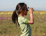 150_Young_Girl_with_Binos_USFWS