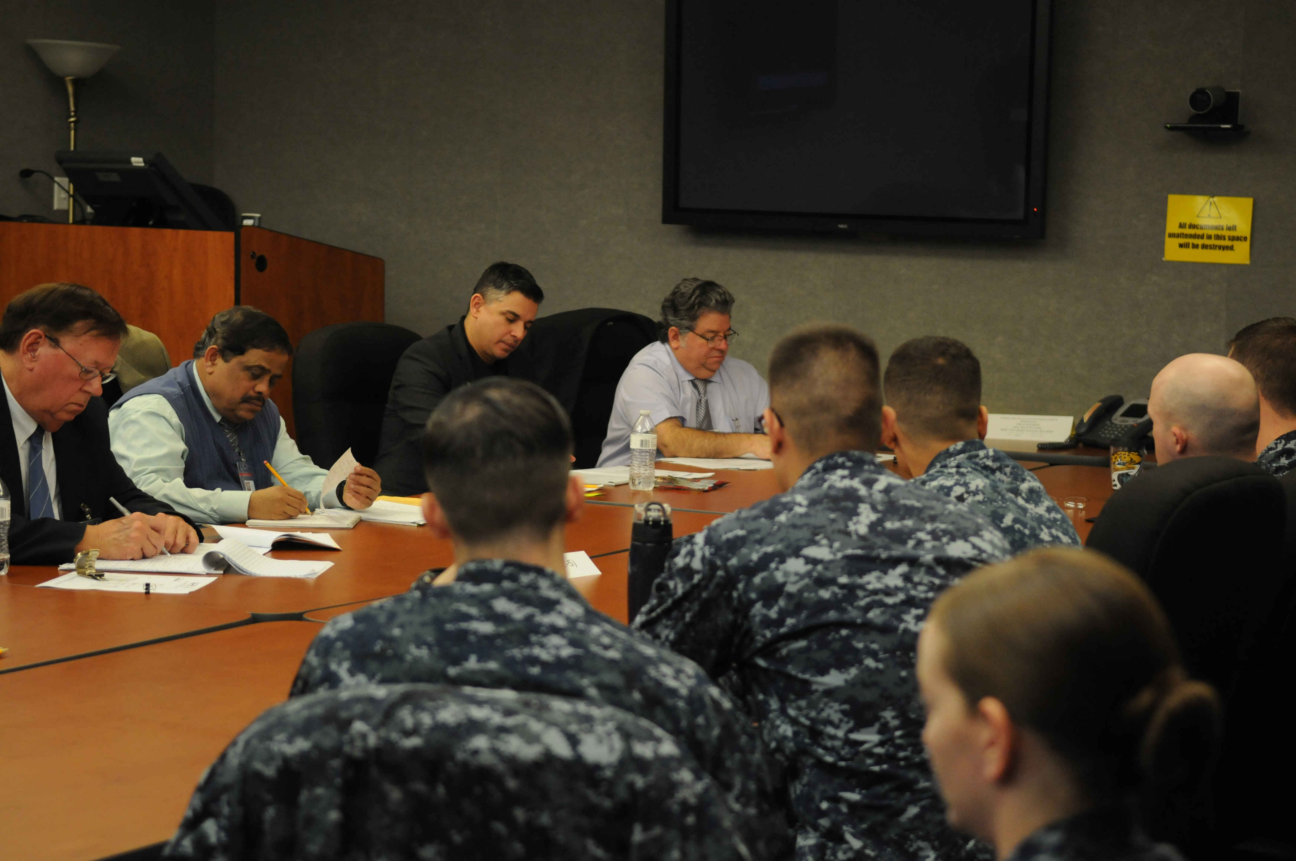 PENSACOLA, Fla. (Feb. 3, 2016) American Council on Education (ACE) team members listen to Sailors from the cryptologic technician (collection) rating as part of an occupational review at the Center for Information Dominance, the information warfare community's training arm. The ACE team's final report will appear in ACE's Military Guide, which presents college-level credit recommendations for formal courses and occupations offered by all branches of the military and are reflected in a Sailor's Joint Services Transcript. U.S. Navy photo by Carla M. McCarthy.