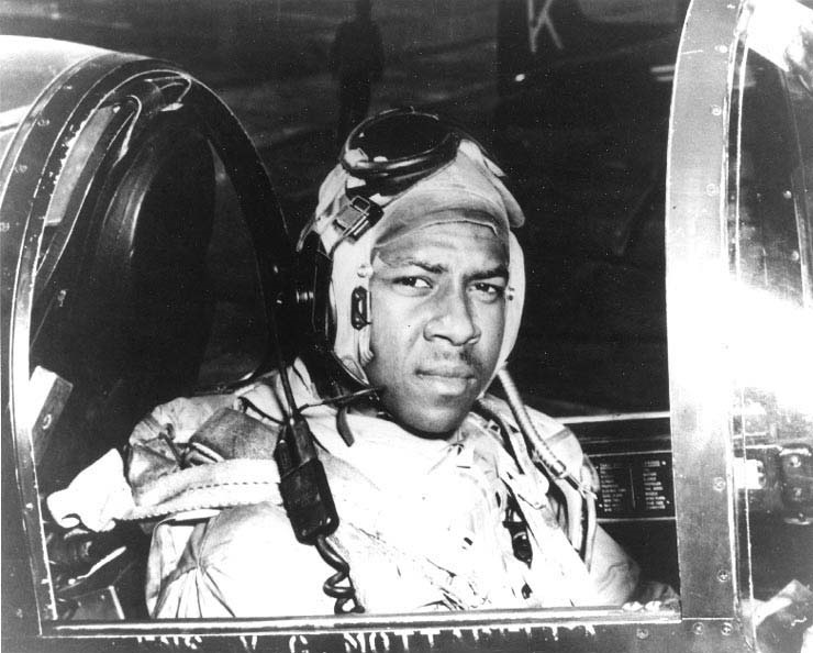 Ensign Jesse L. Brown, USN In the cockpit of an F4U-4 Corsair fighter, circa 1950.
He was the first African-American Naval Aviator, and flew with Fighter Squadron 32 (VF-32) from USS Leyte (CV-32).
