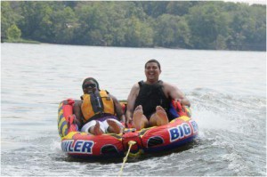 Swimmers and non-swimmers alike were able to participate in tubing fun at Fort Belvoir, Va. Wounded Soldier Jordan Knox along with Shelly Neal, spouse of retired Soldier William Neal, enjoy a few laughs on an exhilarating spin around Tompkins Basin. 
