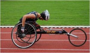 Army Warrior Games medalist Spc. Elizabeth Wasil won three gold medals in racing wheelchair at the 2013 PARA CISM Track and Field Games in Germany. 