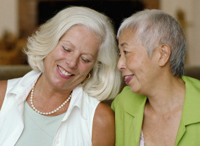 two laughing middle aged women