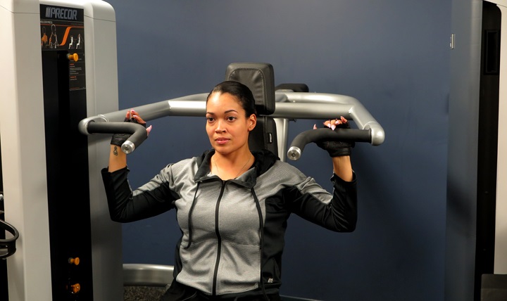 Elizabeth Harris, fitness center manager at Defense Health Headquarters (DHHQ) partakes in a workout session. Harris considers herself to be a fitness ‘lifer’and says, “Being healthy is not a hobby; it’s a lifestyle.”