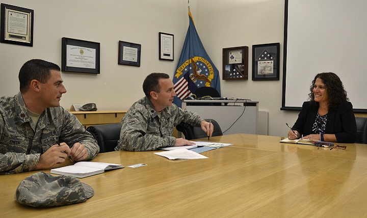 Nora Steigerwalt (left), Medical supply chain director of customer operations, meets with Lt. Col. Christopher Estridge (center) and Maj. Blake Smith (right), both Air Force medical service corps officers from the Defense Health Agency, at Defense Logistics Agency Troop Support in Philadelphia. (DoD photo by Shawn Jones)