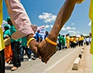 Date: 2014 Location: Mozambique Description: Holding hands © PSI