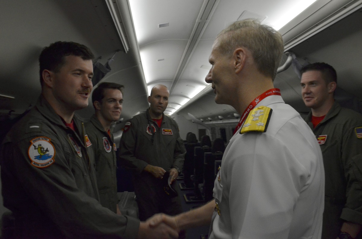 SINGAPORE (Feb. 16, 2016) Commander, U.S. 7th Fleet Vice Adm. Joseph P. Aucoin greets Sailors during a tour of a P-8 Poseidon Maritime Patrol Aircraft while attending the Singapore International Airshow 2016 at Changi Exhibition Center. The airshow, held biennially, is the largest defense exhibition and international tradeshow in the Pacific region.  U.S. Navy photo by Mass Communication Specialist 3rd Class Madailein Abbott